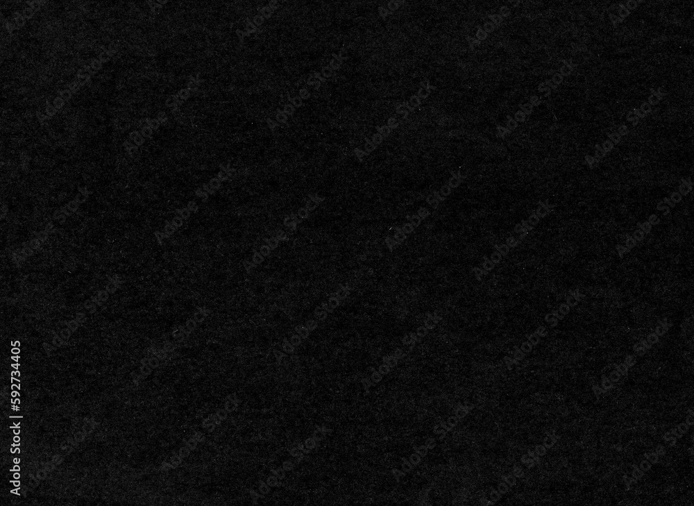 Texture of black paper with dust, hairs and bumps