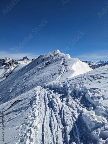 Skimo, Summit Bulenhorn above Monstein. Ski touring in a beautiful mountain world. Hiking through deep snow. High quality photo