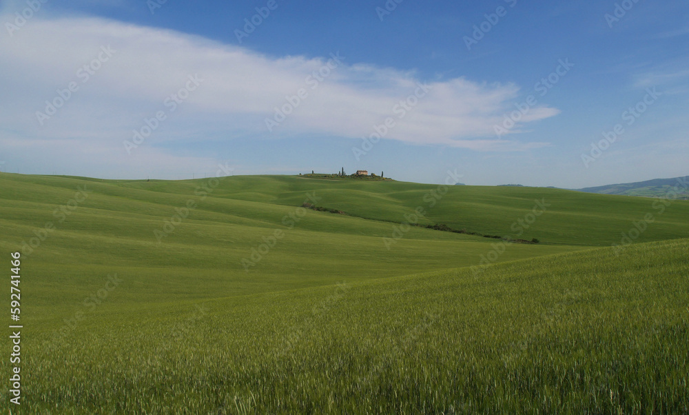 Beautiful landscape of Tuscany, Italy with house in the far distant