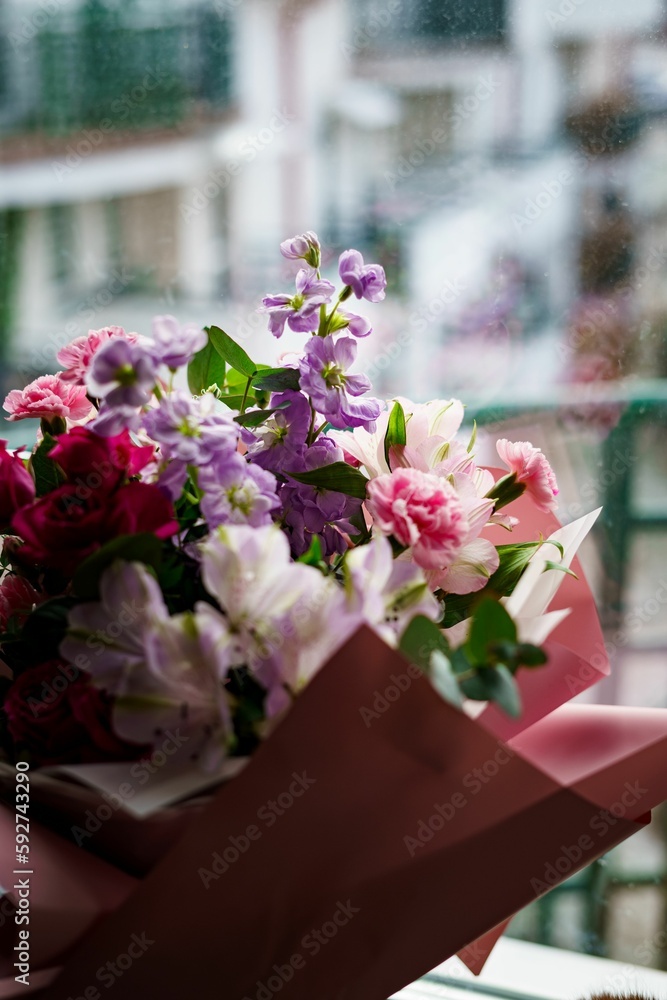 Closeup of bouquet of flowers in pink and purple