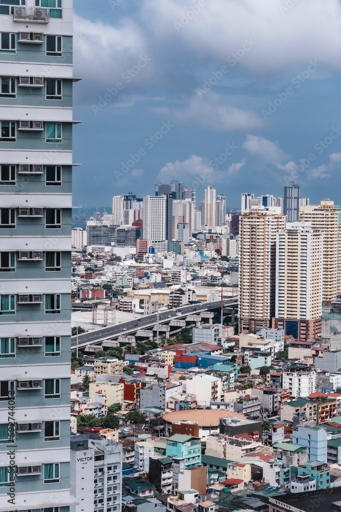 Fototapeta premium Vertical shot of Makati cityscape, Philippines.