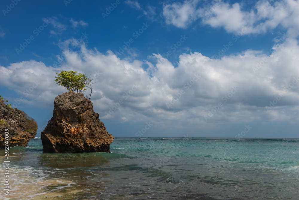 View of the sea from a tropical beach with an expressive sky. Beach in Bali, Indonesia - nature, recreation, background