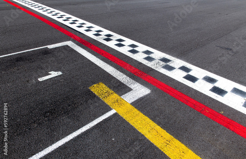 Pole position number one sign on asphalt race track, arrival first win start concept, motor sports symbols © fabioderby