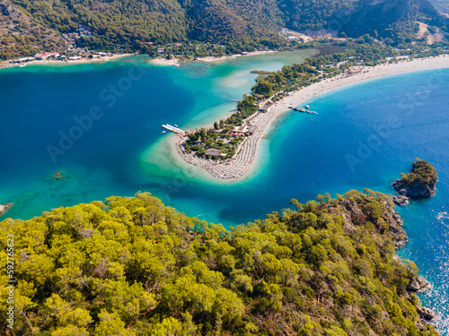 Fototapeta Naklejka Na Ścianę i Meble -  Aerial drone photo of Ölüdeniz, Fethiye, Turkey, showcasing the turquoise waters, picturesque coastline, and beautiful beaches of this popular summer destination.