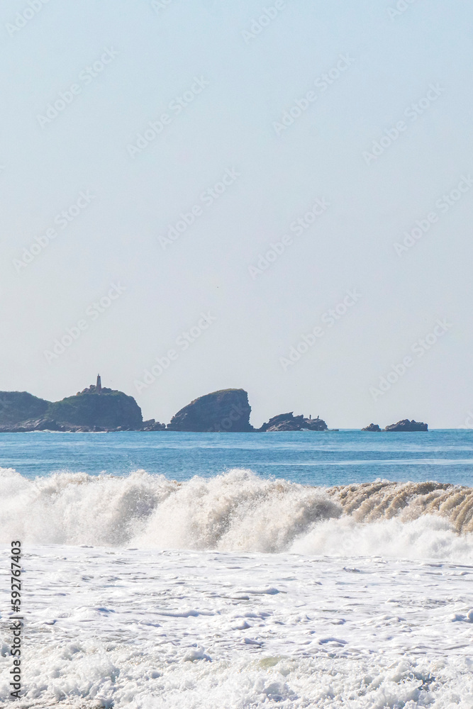 Extremely huge big surfer waves beach La Punta Zicatela Mexico.