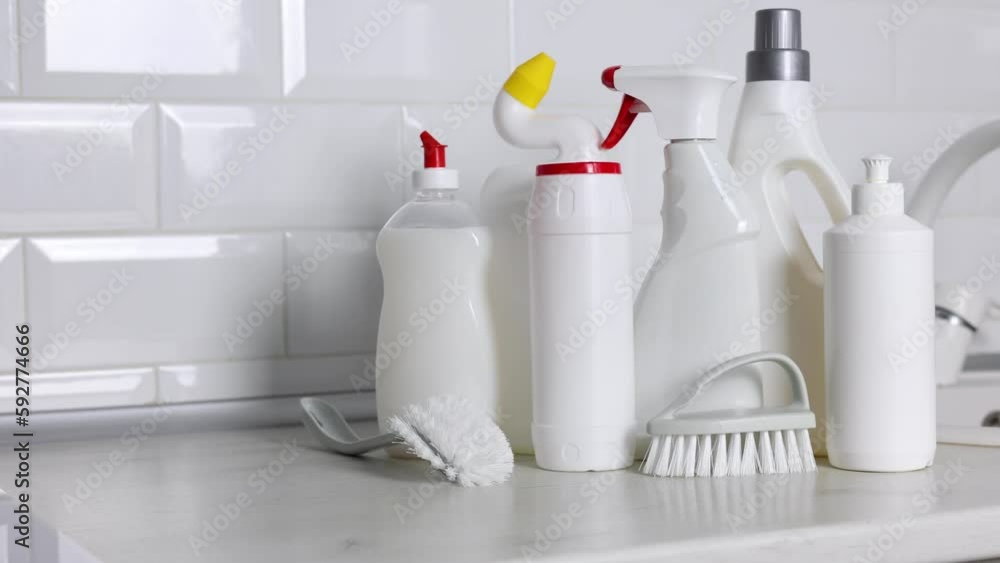 A set of different cleaning and disinfection products against the background of the home interior A set of different cleaning and disinfection products against the background of the home interior