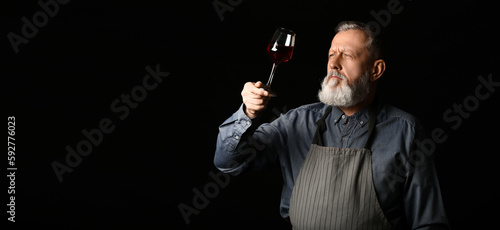 Portrait of mature sommelie...