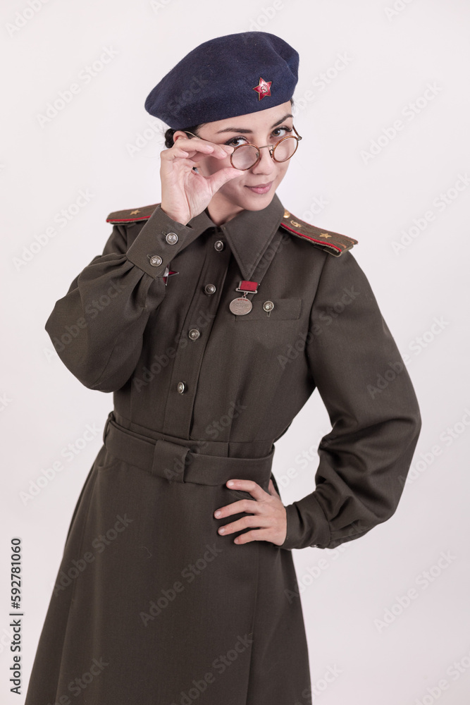 A woman in a retro military uniform, a military police of the Soviet army during World War Two A woman in a retro military uniform, a military police of the Soviet army during World War Two