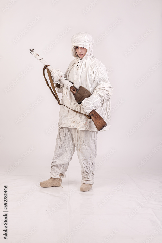 A woman in a winter military uniform white camouflage, a soldier of the Soviet army during World War Two A woman in a winter military uniform white camouflage, a soldier of the Soviet army during World War Two