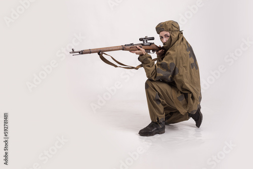 A woman in a retro military uniform, a soldier of the Soviet army during World War Two