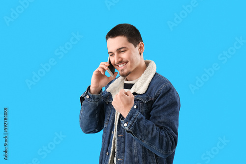 Happy young man talking by ...
