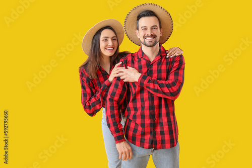 Young couple on yellow back...