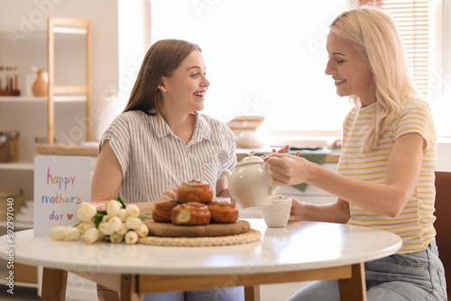 Mature woman with her daugh...