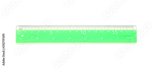 Green plastic ruler on white background