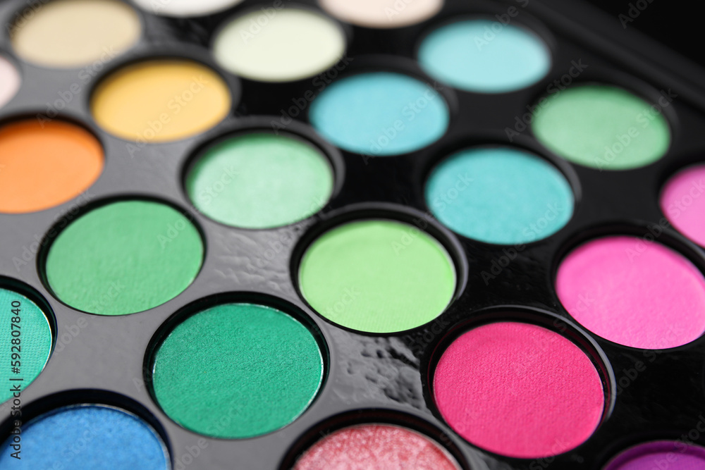 Beautiful eyeshadow palette as background, closeup. Professional cosmetic product Beautiful eyeshadow palette as background, closeup. Professional cosmetic product