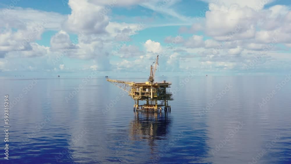 Aerial view from a drone of a small offshore platform in the middle of the ocean
Aerial view from a drone of a small offshore platform in the middle of the ocean