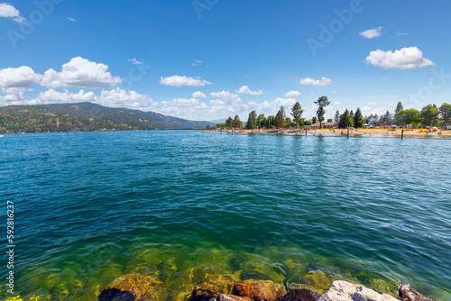 View of Lake Pend Oreille and the mountains of Sandpoint North Idaho, USA, from the City Beach Park in Sandpoint, Idaho. 
