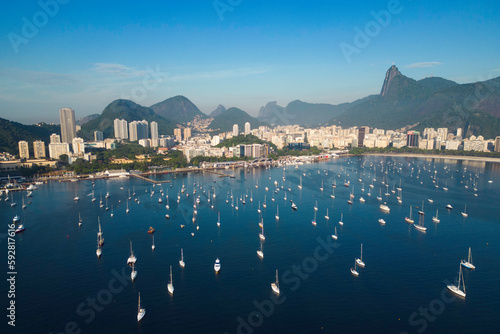 Scenic View of Rio de Janeiro City and Corcovado Mountain with Christ the Redeemer, Boats in the Harbor and Hills photo