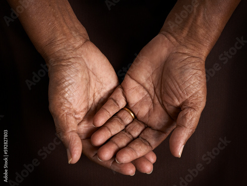 Open hands. Holding, giving, showing concept.Wrinkled old hands offering helping hand.