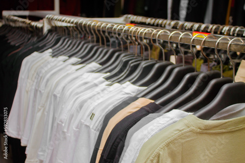 Wallpaper Mural clothes hanging in a clothing store Torontodigital.ca