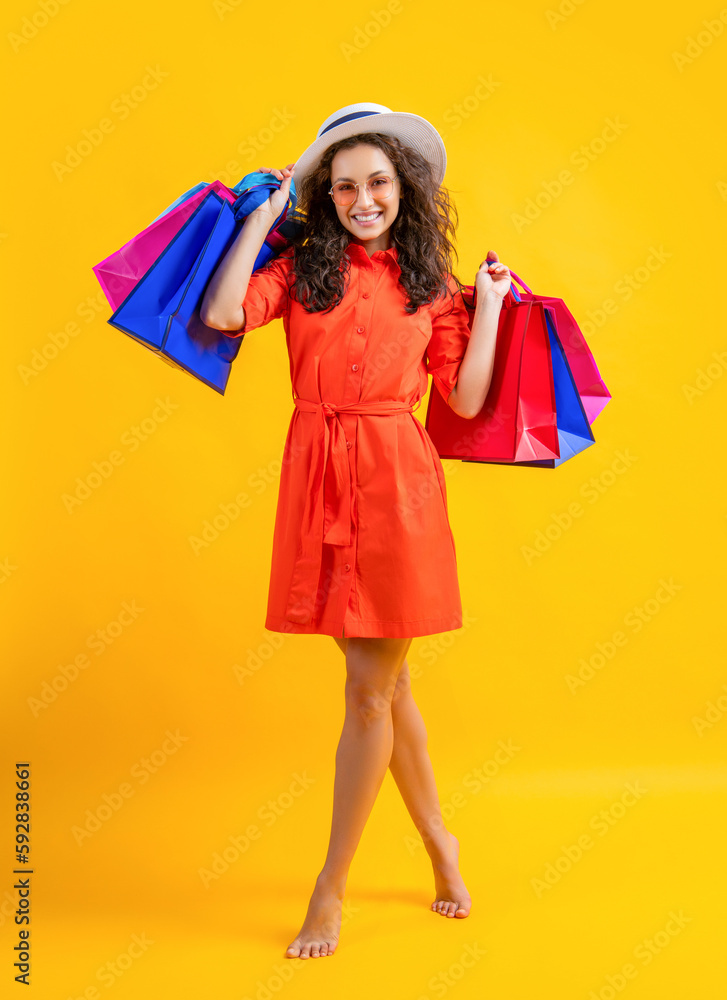 happy shopping woman at summer sale in studio. shopping woman at summer sale happy shopping woman at summer sale in studio. shopping woman at summer sale