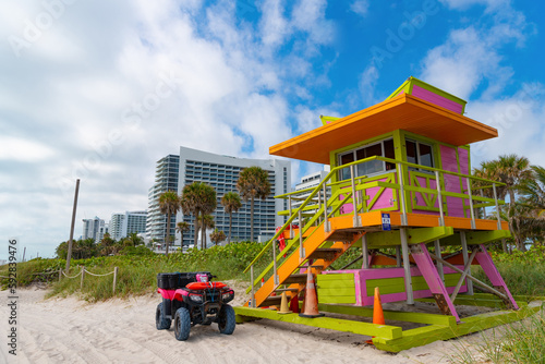 image of lifeguard at miami beach with quad bike. lifeguard at miami beach.