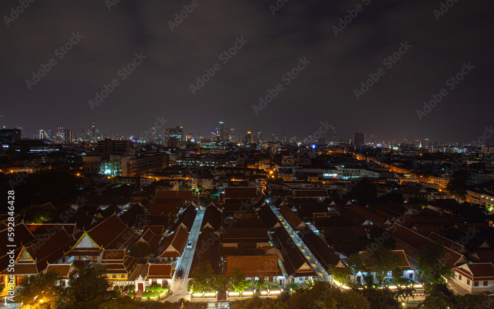 Fototapeta premium .Temples and buildings in Bangkok at twilight.beautiful lighting background. Bangkok at night.