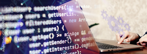 girl programmer at home writes programming code script on virtual screen