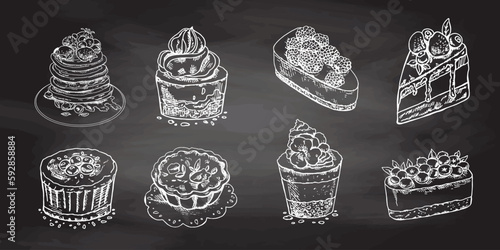 Desserts set  isolated on chalkboard  background. Vintage Illustration. Hand drawn sketch of Delicious Cupcakes and cakes With cream and berry tops  pancakes with berries and syrup  tartlets. Design 