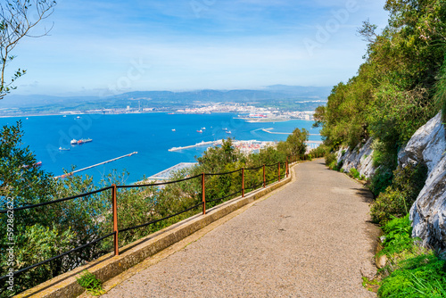 A path in Gibraltar Natural Reserve with a view of Bay of Gibraltar from the Upper Rock, UK
