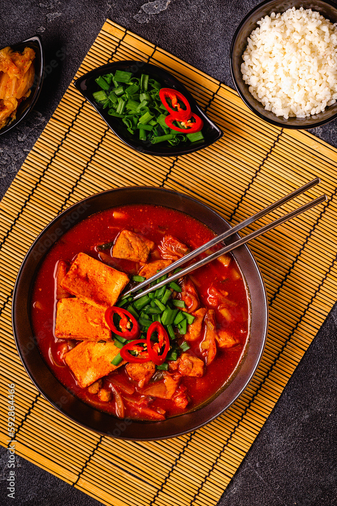 Korean traditional food, spicy kimchi soup (kimchi tige) with pork and