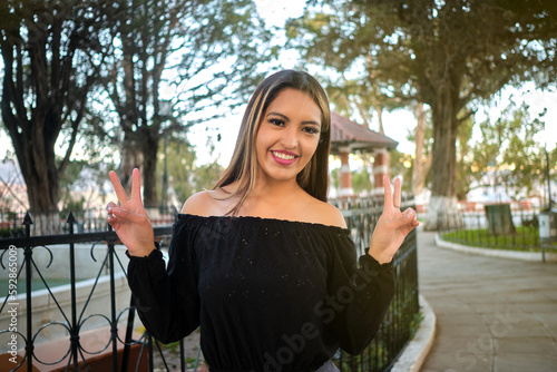 happy and cheerful woman enjoying the day at an outdoor park in la paz bolivia