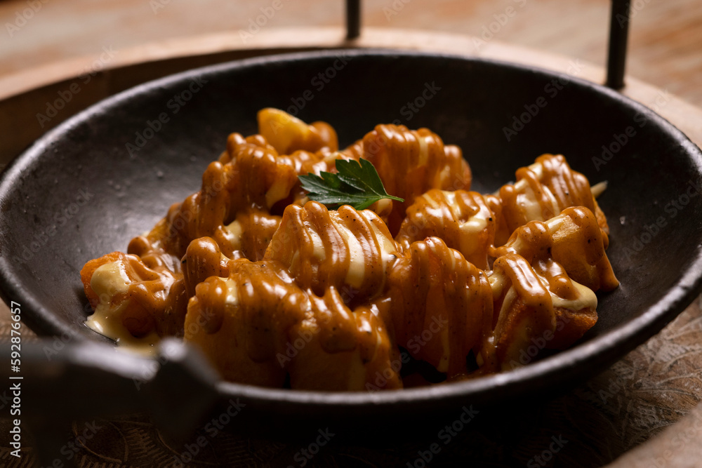 Papas bravas, are a typical preparation of bars in Spain consisting of