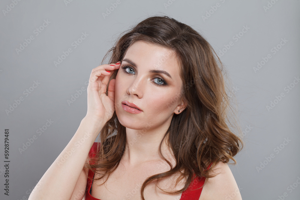Perfect lady with makeup and wavy hair on white background. Beautiful female face Perfect lady with makeup and wavy hair on white background. Beautiful female face