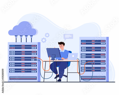 System administrator, Technician works is working on computer in server room. Cloud storage technology