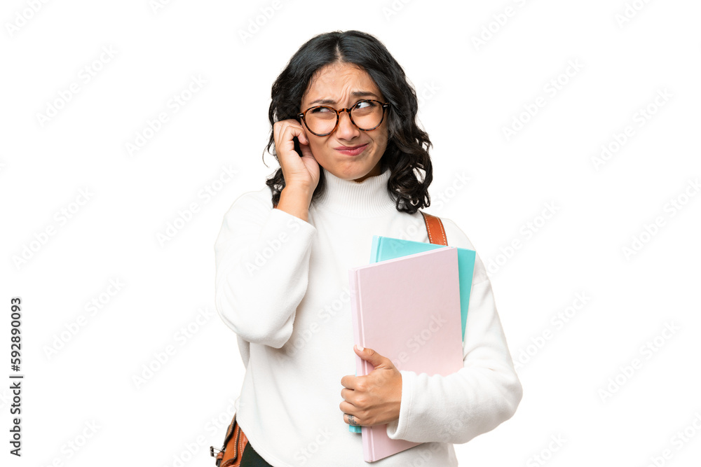 Young Argentinian student woman over isolated background frustrated and covering ears Young Argentinian student woman over isolated background frustrated and covering ears