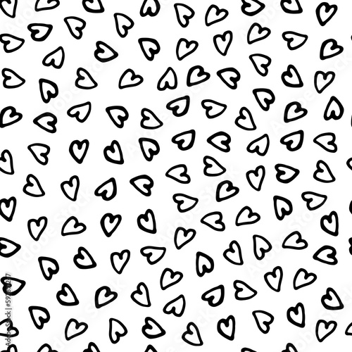 Seamless pattern of hand drawn hearts- illustration. Monochrome ornament. © kseniavasil