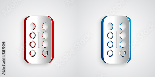 Paper cut Sedative pills icon isolated on grey background. Paper art style. Vector