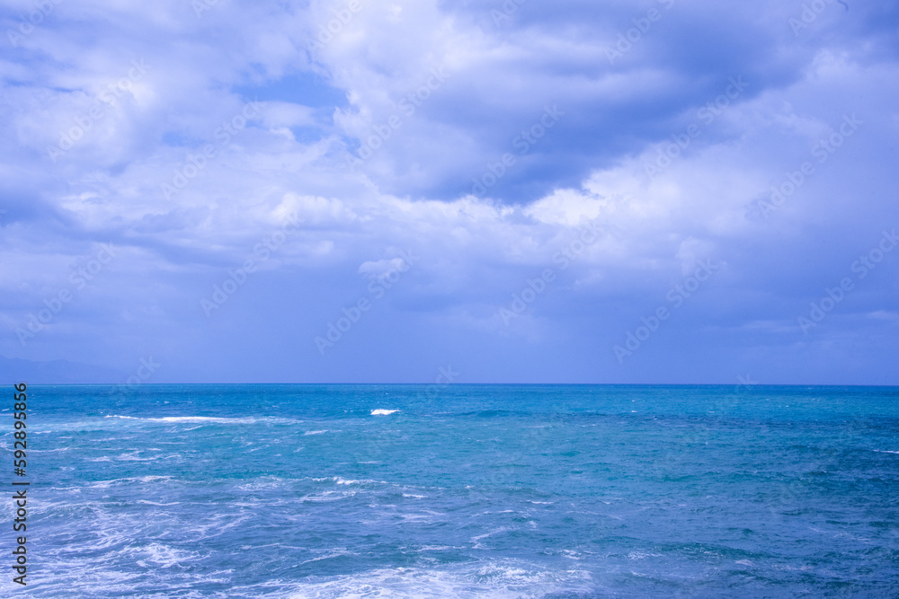 Agitated sea seen from the beach of Cefalù in Sicily, Italy