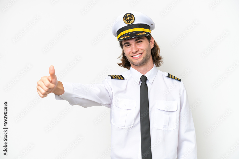 handsome Airplane pilot isolated on white background giving a thumbs up gesture handsome Airplane pilot isolated on white background giving a thumbs up gesture