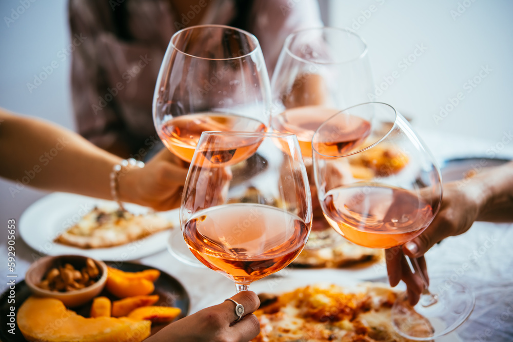 Glasses of rose wine seen during a friendly party of a celebration.