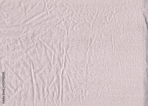 Gray tulle fabric with small wrinkled folds. Uniform surface of natural fabric fine dotted texture
