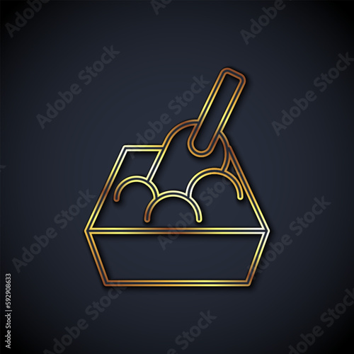 Gold line Cat litter tray with shovel icon isolated on black background. Sandbox cat with shovel. Vector