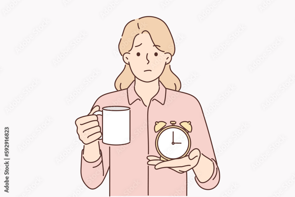 Businesswoman with alarm clock and cup of coffee offers to take break from work and cheer up Businesswoman with alarm clock and cup of coffee offers to take break from work and cheer up