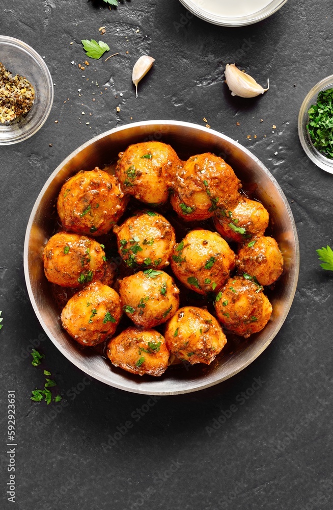 Bombay potatoes in bowl Bombay potatoes in bowl
