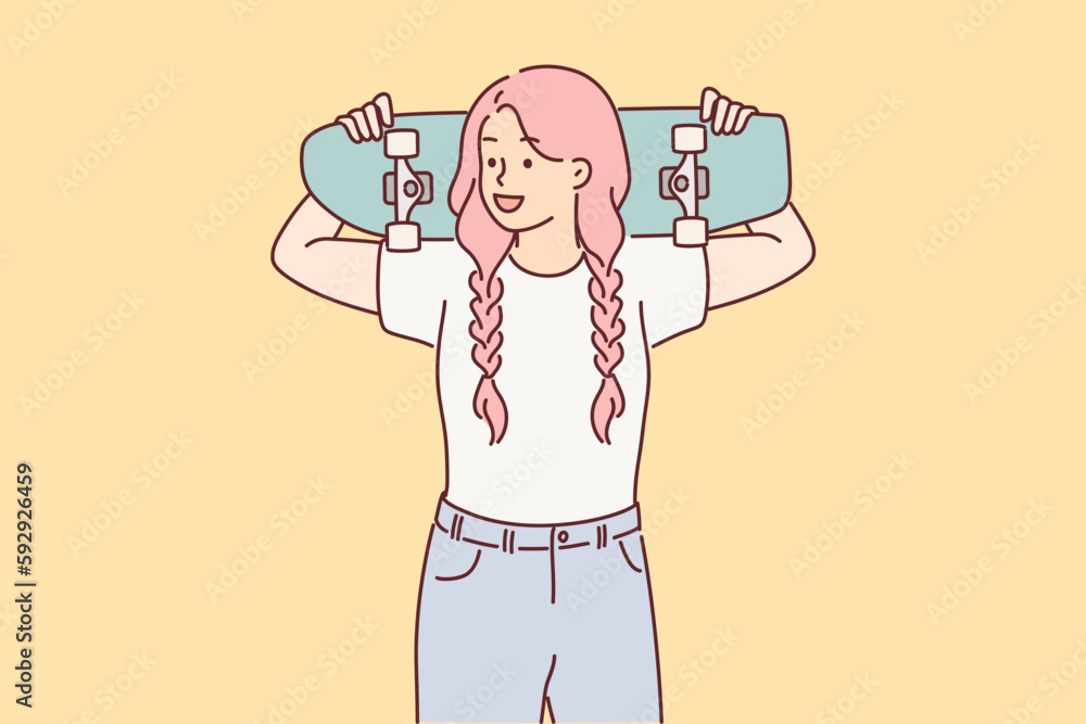 Φωτογραφία Teen girl holds skateboard in hands, wanting to ride through city streets or par