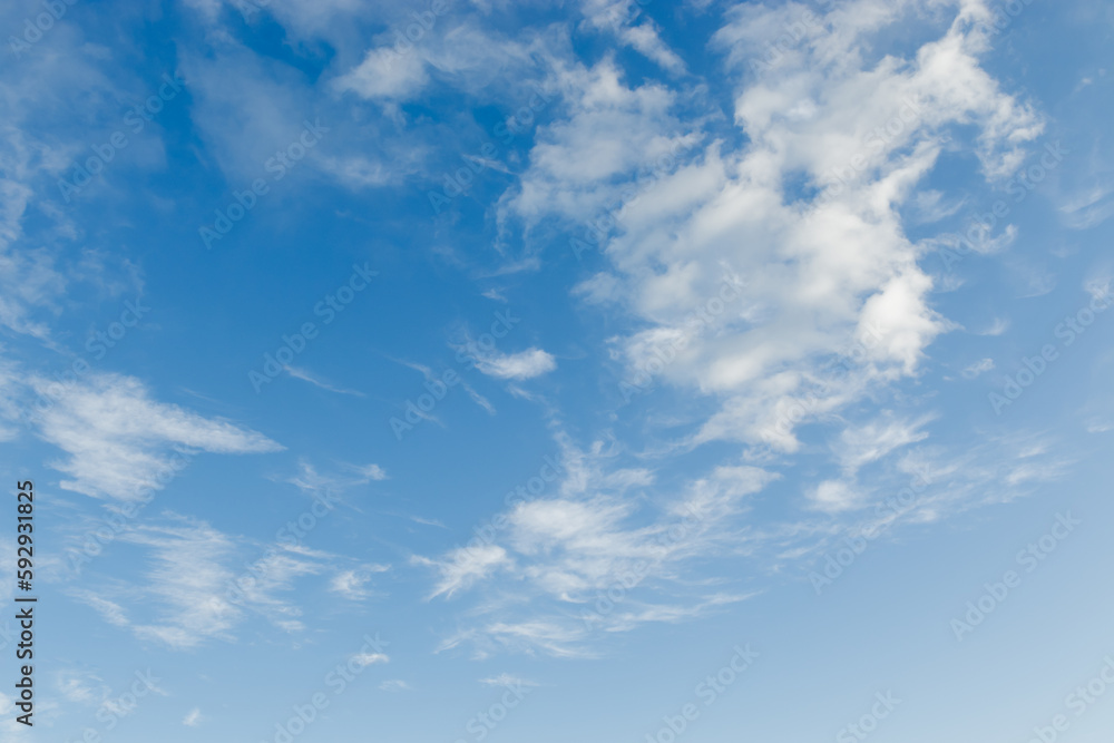 Fototapeta premium Blue sky background with white clouds