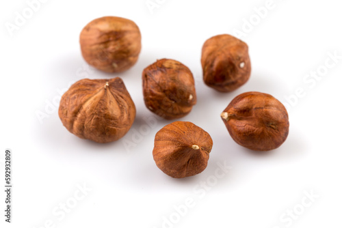 Hazelnuts on the white background