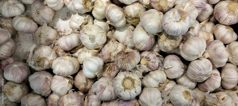 Garlic on display in a market stall,close-up. Garlic on display in a market stall,close-up.