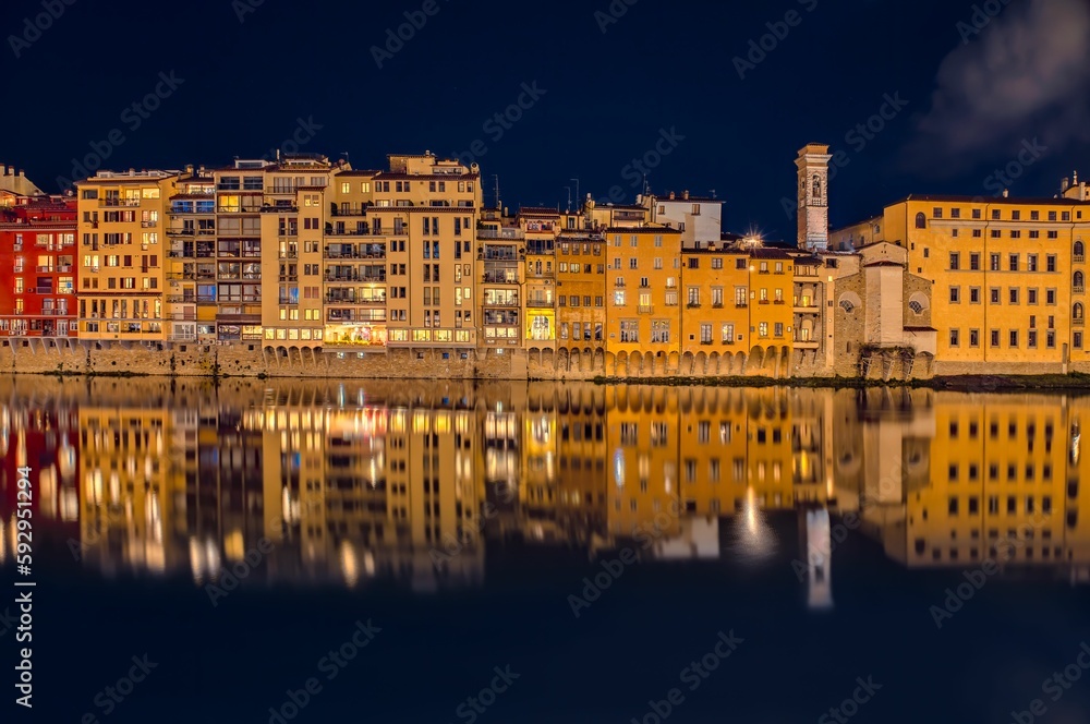 Aerial view of cityscape Florence surrounded by buildings in night Aerial view of cityscape Florence surrounded by buildings in night